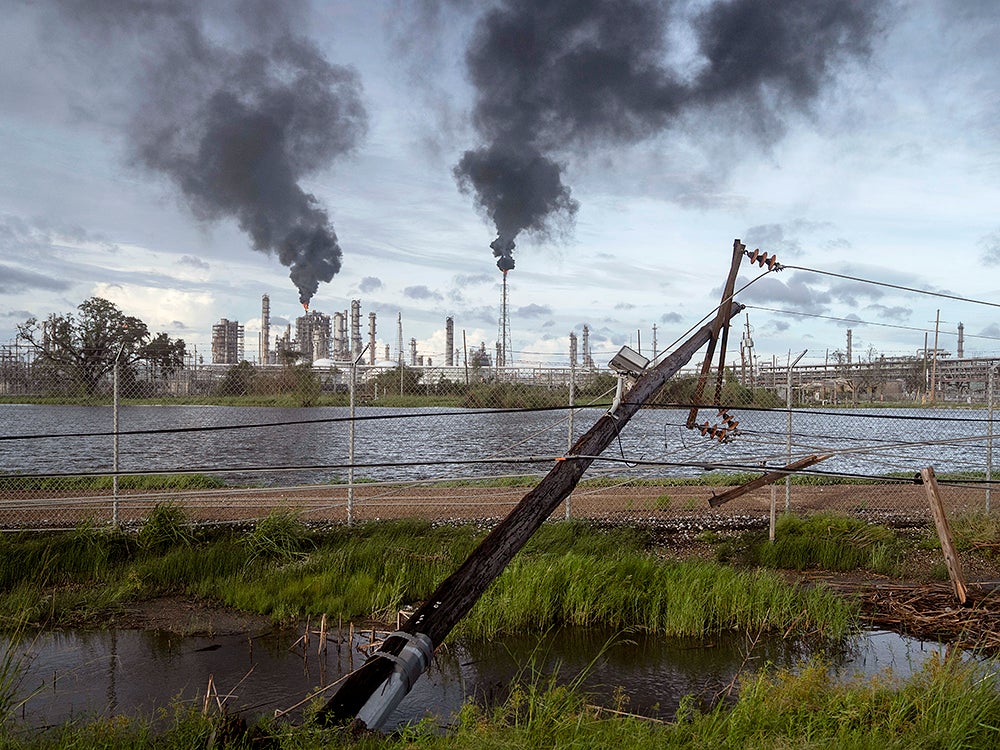 Hurricane Ida toppled these power lines near a petroleum refinery outside LaPlace, Louisiana. Ida's eastern wall went right over LaPlace, inflicting heavy damage on the area.(Michael Robinson Chavez / The Washington Post via Getty Images)